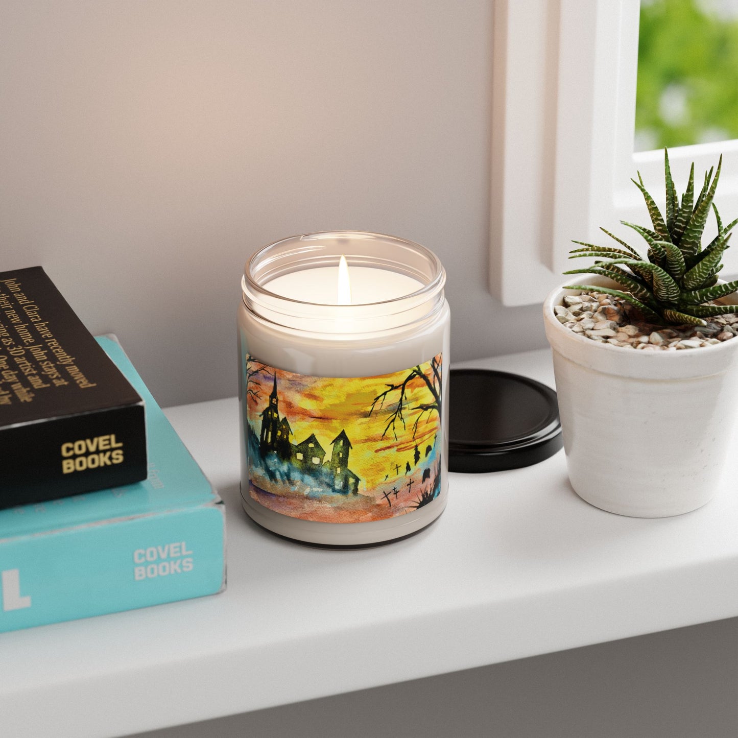 Eco-Friendly Soy Candle (9 oz.), Featuring Vibrant Halloween House and Graveyard Art. Multiple Scents Available.