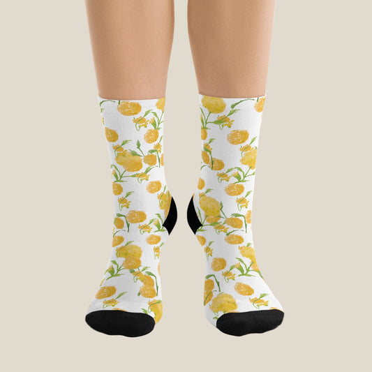 White socks with yellow floral pattern